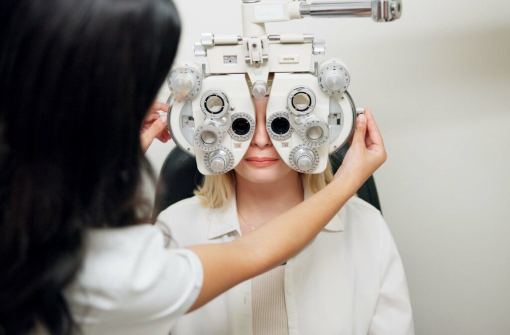 A women getting her glasses prescription updated at the eye doctor